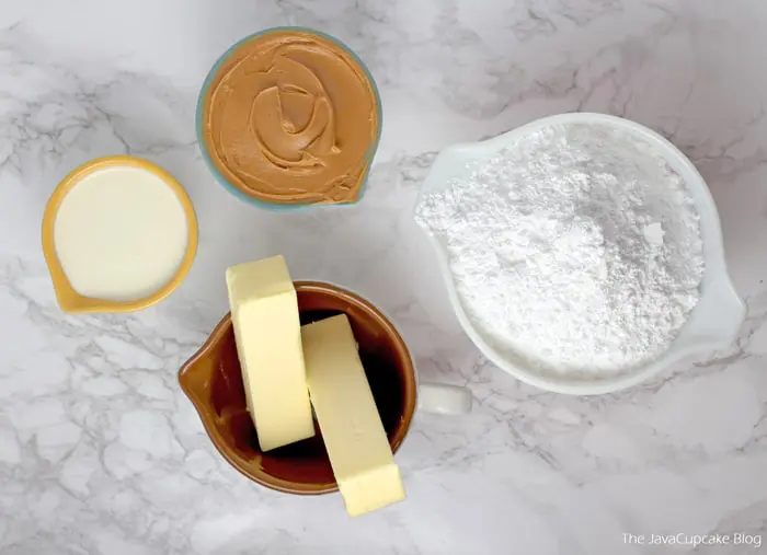 Ingredients for peanut butter frosting - powdered sugar, peanut butter, butter and heavy cream