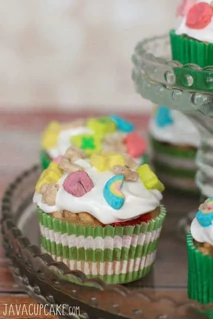 Celebrate St. Patrick's Day with these festive and fun Lucky Charms Cupcakes | JavaCupcake.com