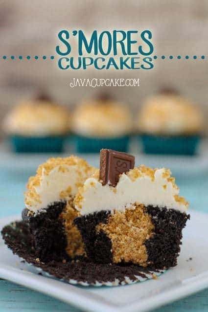 S'mores Cupcakes - rich chocolate cake filled with graham cracker topped with whipped marshmallow frosting. Hershey's chocolate and graham cracker crumbs!  | JavaCupcake.com