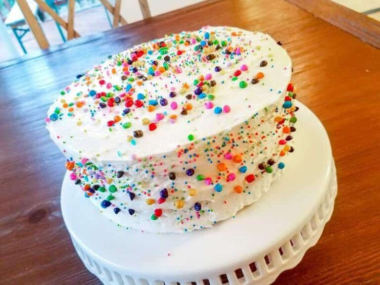 My Favorite Birthday Cake - Espresso Chocolate Cake filled with Raspberry and topped with Whipped Vanilla Buttercream | The JavaCupcake Blog https://javacupcake.com