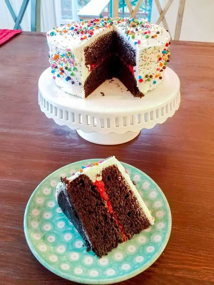 My Favorite Birthday Cake - Espresso Chocolate Cake filled with Raspberry and topped with Whipped Vanilla Buttercream | The JavaCupcake Blog https://javacupcake.com