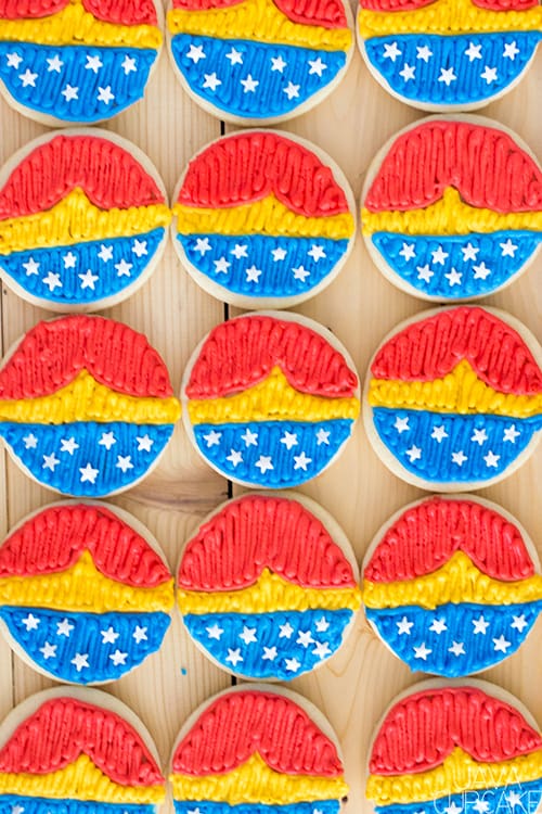 Wonder Woman Cookies - Soft sugar cookies topped with buttercream decorated as my favorite super hero, Wonder Woman! | The JavaCupcake Blog https://javacupcake.com