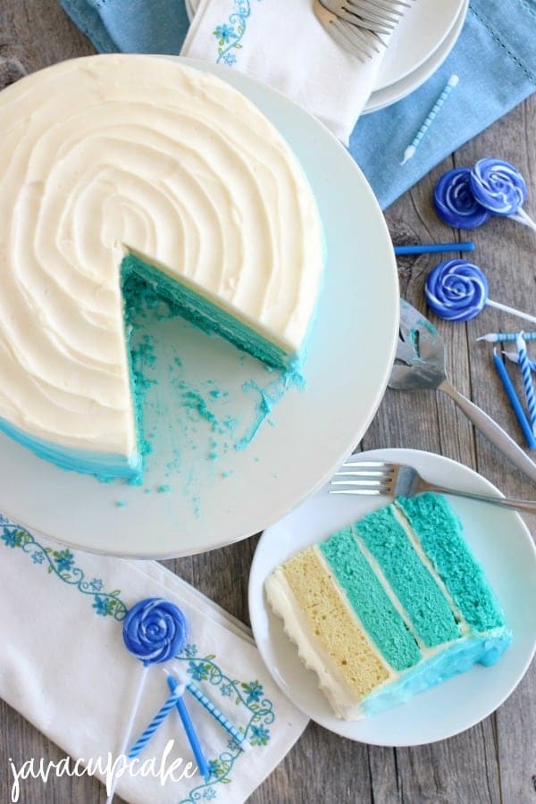 Blue Ombre Cake cut on white plate