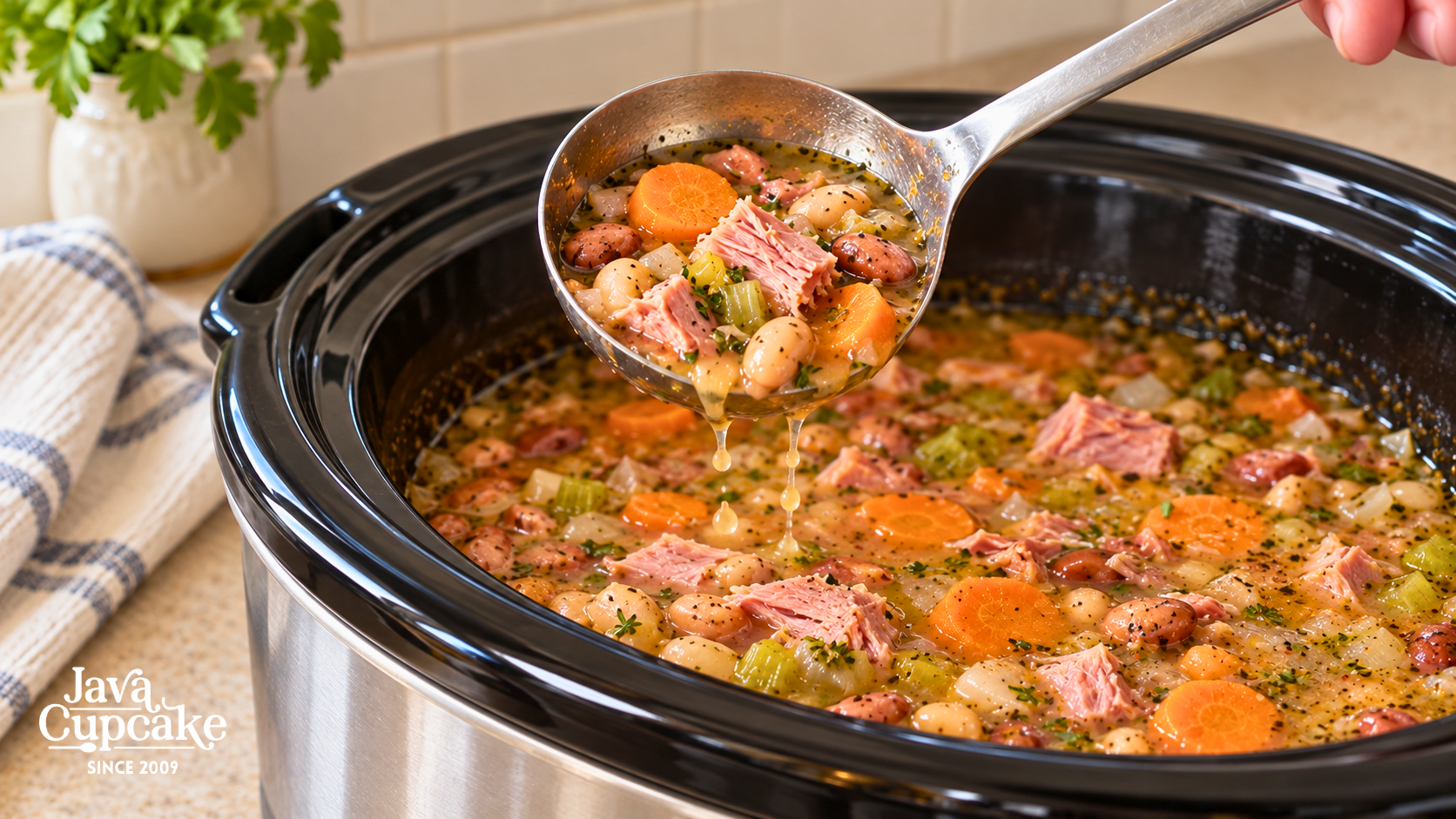 A ladle of ham and mixed bean soup held over a slow cooker.